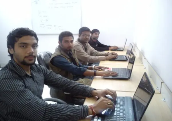 Students working on mobile app development in Jaipur